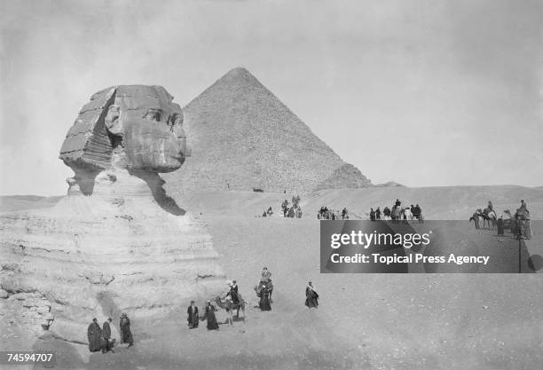 Group of American tourists from the Cunard liner 'Scythia' visit the Great Pyramid and Sphinx at Giza, April 1923.