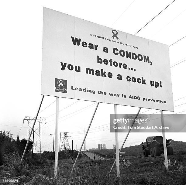Sign warning miners about the dangers of HIV/AIDS at the Lonmin platinum mine in the Marikana area of South Africa, October 2000. 17,000 men work in...