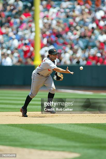 Kevin Millar of the Baltimore Orioles makes the play at first base during the game against the Los Angeles Angels of Anaheim at Angel Stadium in...