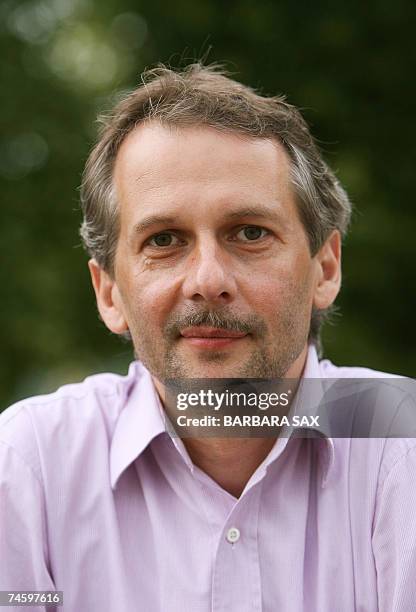 The artistic director of documenta 12 art fair Roger M. Buergel poses 14 June 2007 in Kassel, central Germany. The twelfth edition of the documenta,...
