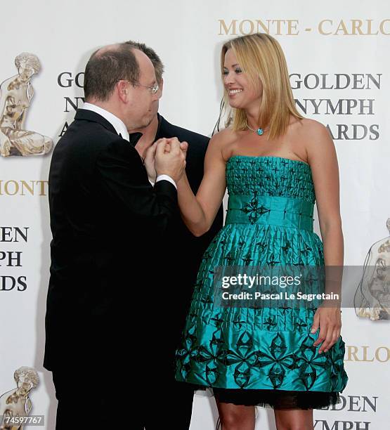 Prince Albert II of Monaco greets actress Kristanna Loken as he attends the 2007 Monte Carlo Television Festival closing ceremony held at Grimaldi...