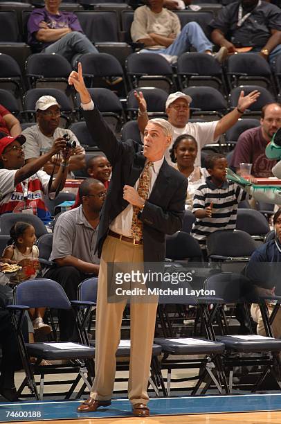 Head coach Brian Winters of the Indiana Fever calls a play from the sideline during a WNBA game against the Washington Mystics at the Verizon Center...