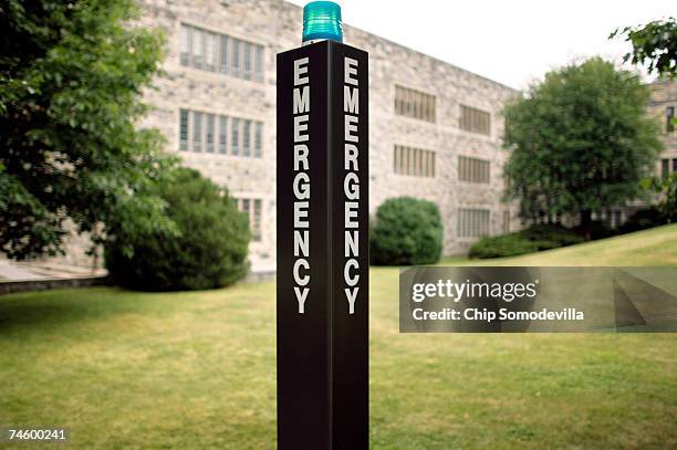 An emergency call box stands outside Norris Hall ahead of the building's phased re-use on the campus of Virginia Tech June 14, 2007 in Blacksburg,...
