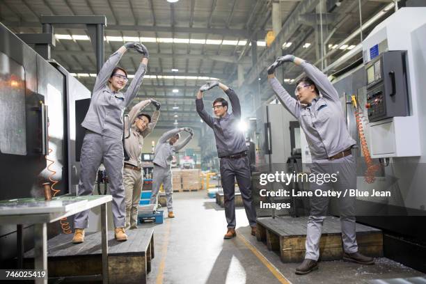 165 Factory Worker Stretching Stock Photos, High-Res Pictures, and ...