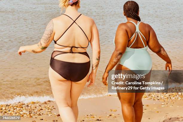 Two Young Women Walking