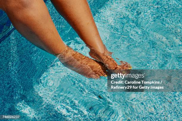 young woman by the pool - noapologiescollection stock-fotos und bilder