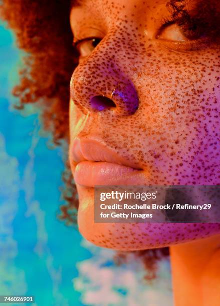 beauty profile of young woman with freckles  - body positivity stock-fotos und bilder