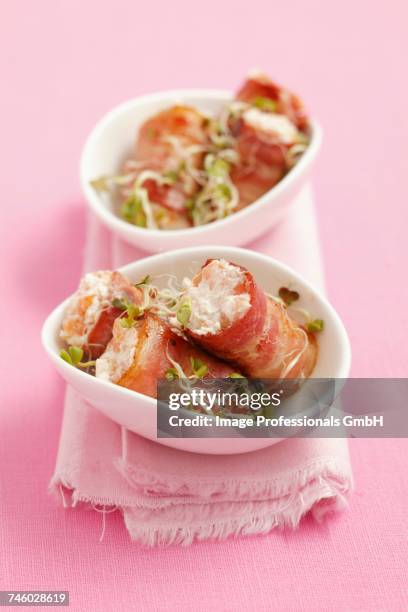 rolls of smoked bacon filled with smoked salmon mousse - fischmousse stock-fotos und bilder