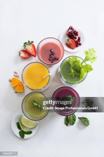 various sweet and spicy smoothies (seen from above) - beetroot smoothie stock pictures, royalty-free photos & images