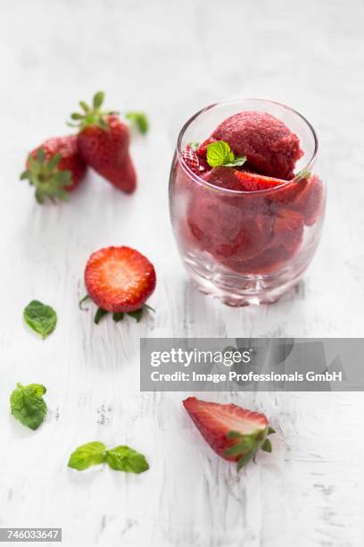 strawberry sorbet with fresh mint in a glass - raspberry sorbet stock pictures, royalty-free photos & images
