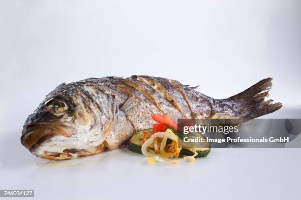 fried catfish with a side of vegetables - fried catfish stock pictures, royalty-free photos & images