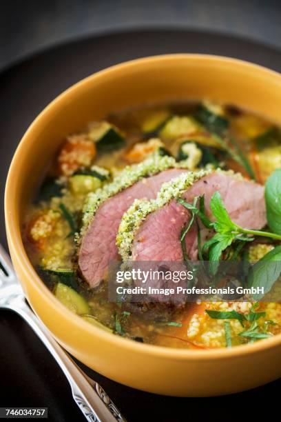 leg of lamb with a mint crust and couscous - leg of lamb stock pictures, royalty-free photos & images