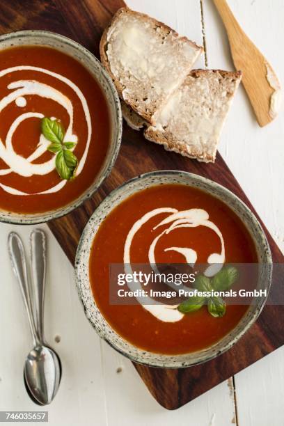 tomato soup with cherry, crme frache and basil - creme fraiche stock pictures, royalty-free photos & images
