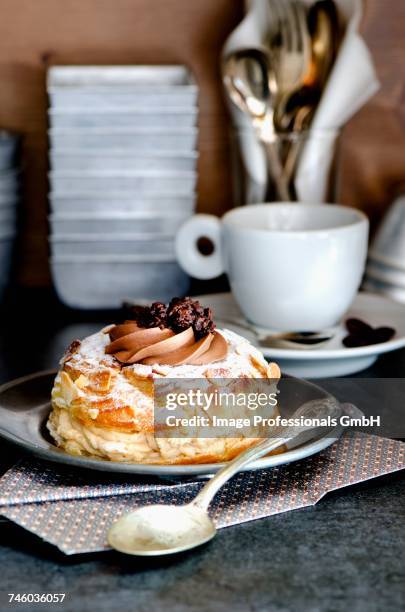 paris brest (choux pastry filled with cream, france) - choux pastry stock pictures, royalty-free photos & images