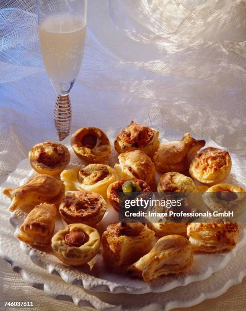 selection of cocktail snacks - puff pastry stock pictures, royalty-free photos & images