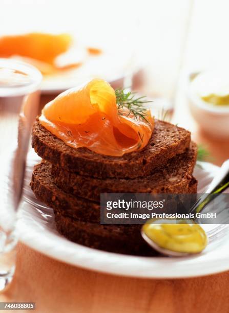 salmon gravlax - rye bread stock pictures, royalty-free photos & images