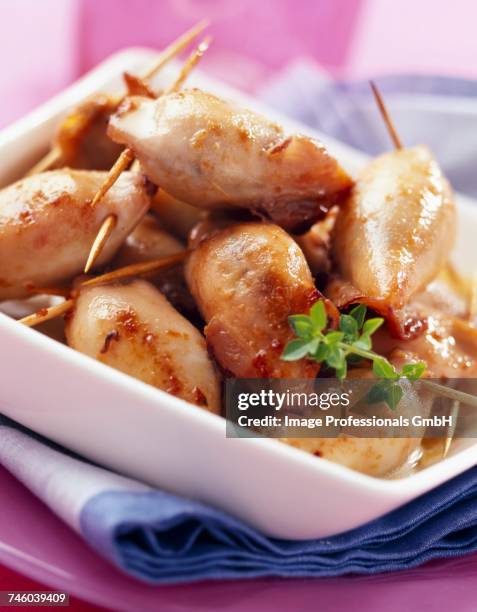 parmesan stuffed squid - aclamar stock pictures, royalty-free photos & images