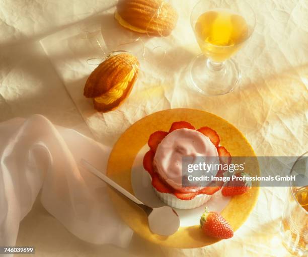 strawberry souffl_ and madeleines with cream filling - souffle stock pictures, royalty-free photos & images