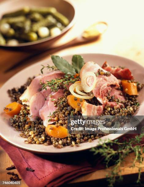 salt pork with lentils - gezout stockfoto's en -beelden