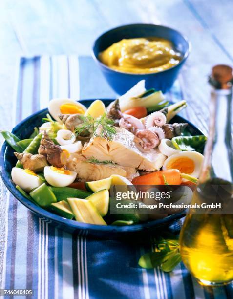 marseilles cod and poached vegetable aoli - aioli stock-fotos und bilder