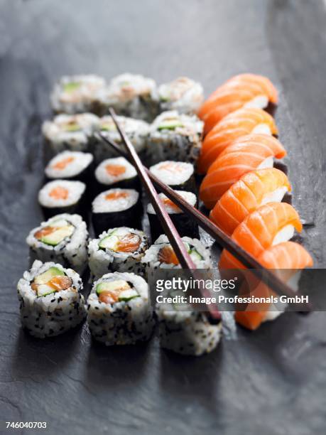 assorted makis and sushis - sushis stockfoto's en -beelden