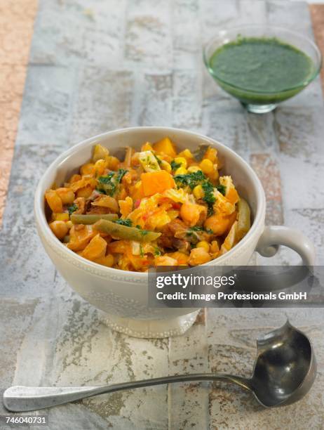 puchero from the canary islands with chickpeas ,sweet corn,red pepper and kombo seaweed - red seaweed stock pictures, royalty-free photos & images