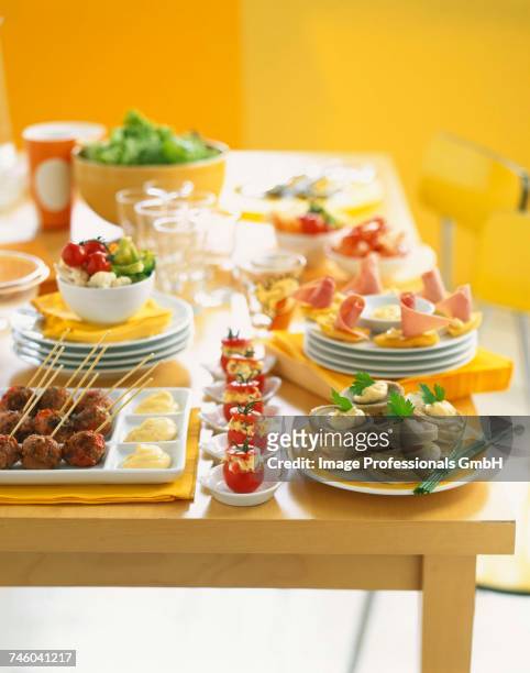 selection of appetizers - canap�� fotografías e imágenes de stock