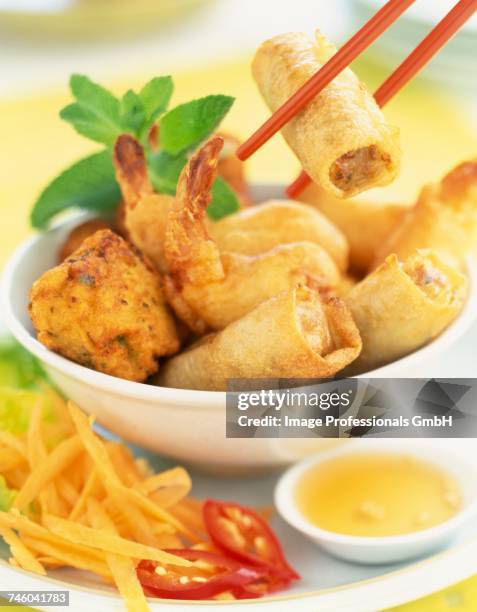 assorted chinese appetizers - fishball stock-fotos und bilder