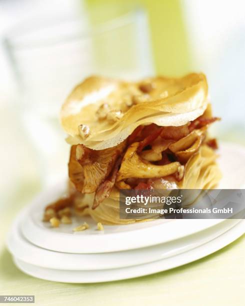 chanterelle puff pastry layer - cantharellus tubaeformis stock pictures, royalty-free photos & images