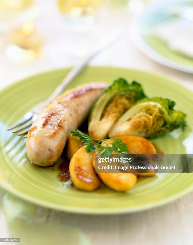 White sausage with apples and mini cabbages