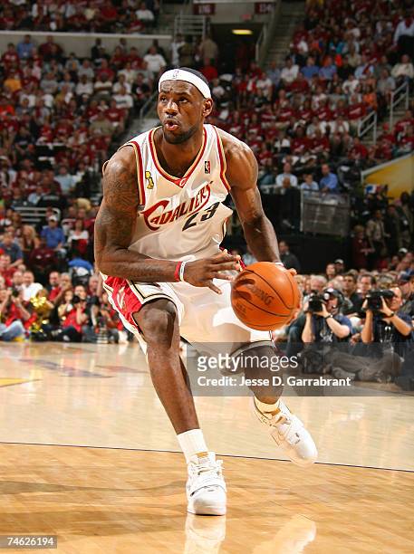 LeBron James of the Cleveland Cavaliers drives against the San Antonio Spurs in Game Four of the NBA Finals at the Quicken Loans Arena on June 14,...