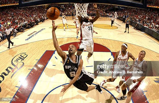 Tony Parker of the San Antonio Spurs shoots against LeBron James of the Cleveland Cavaliers in Game Four of the 2007 NBA Finals at The Quicken Loans...