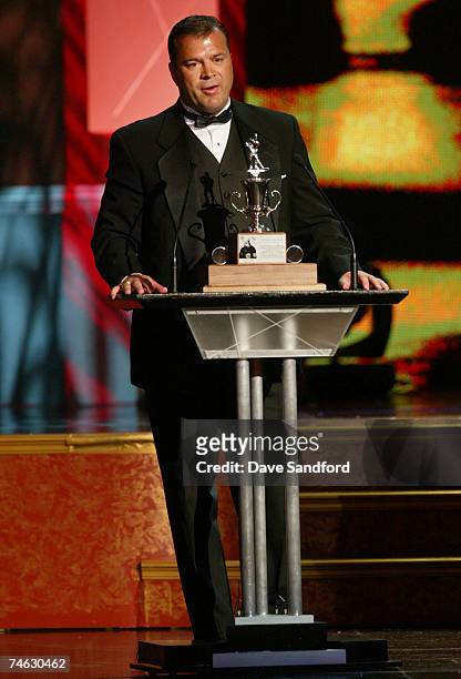 Head coach Alain Vigneault of the Vancouver Canucks accepts the Jack Adams Award for Coach of the Year onstage during the 2007 NHL Awards Show at the...