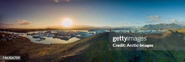 aerial view of icebergs in jokulsarlon, breidamerkurjokull, vatnajokull ice cap, iceland. this image is shot with a drone.  - breidamerkurjokull glacier stockfoto's en -beelden