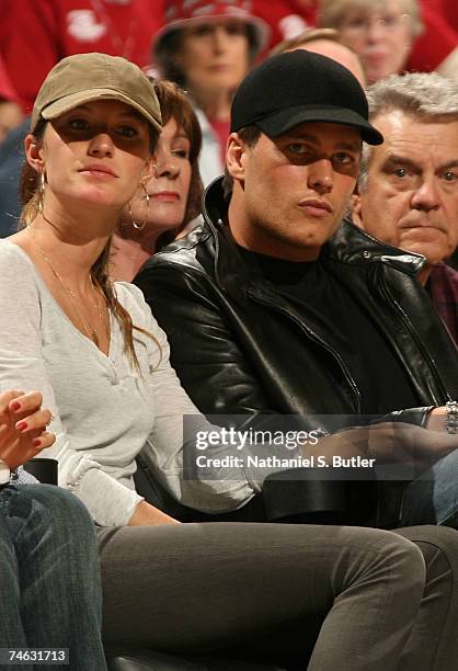 Model Gisele Bundchen and New England Patriots quarterback Tom Brady sit courtside for Game Four of the NBA Finals between the Cleveland Cavaliers...