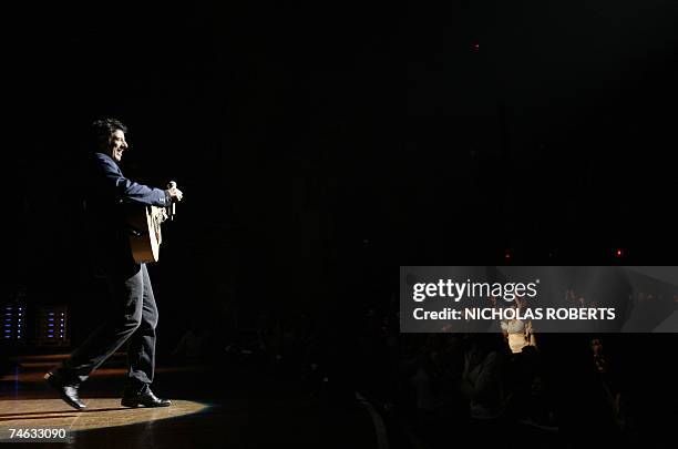 New York, UNITED STATES: Patrick Bruel performs at the Beacon Theatre in New York 14 June 2007. Bruel said that this was his first performing in...