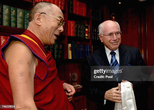 Australian Prime Minister John Howard greets the 14th Dalai Lama on June 15, 2007 in Sydney, Australia. The Dalai Lama, spiritual leader of Tibet and...