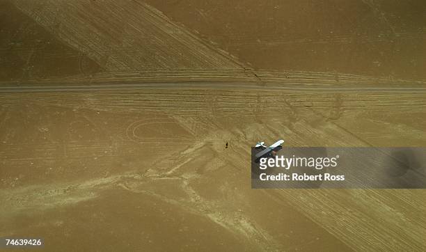 small airoplane on a desert strip - namibia airplane stock-fotos und bilder