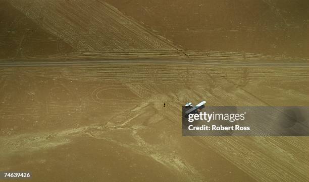 small airoplane on a desert strip - namibia airplane stock pictures, royalty-free photos & images