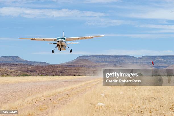 small private plane taking off - namibia airplane stock pictures, royalty-free photos & images