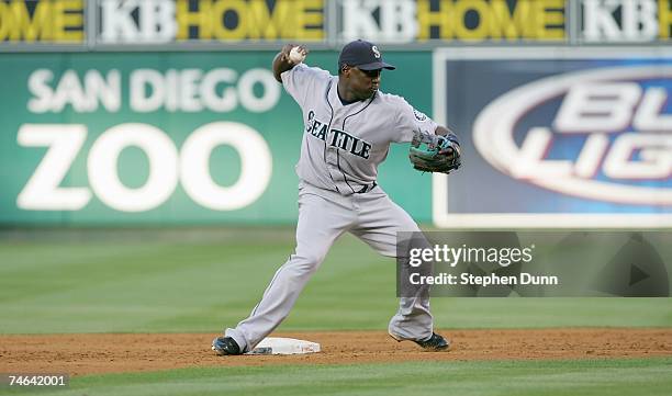 Yuniesky Betancourt of the Seattle Mariners throws to firstbase against the Los Angeles Angels of Anaheim on May 28, 2007 at Angel Stadium in...