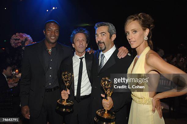 Brian Grazer, Jon Cassar and Kim Raver, winners Outstanding Drama Series for "24" at the Shrine Auditorium in Los Angeles, California