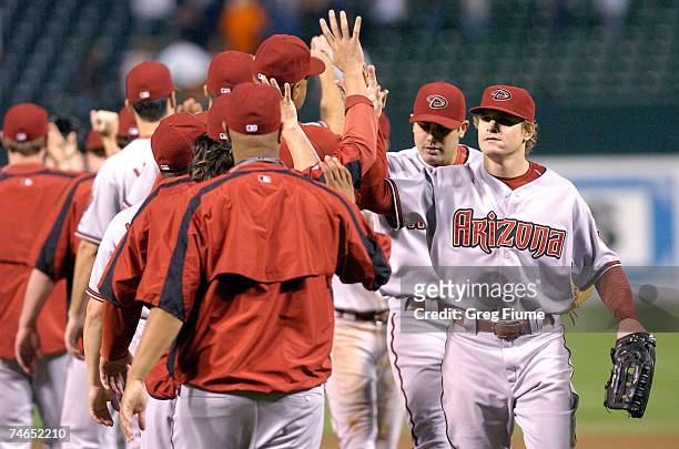 Eric Byrnes of the Arizona Diamondbacks celebrates with teammates after beating the Baltimore Orioles 7-3 at Camden Yards June 15, 2007 in Baltimore,...
