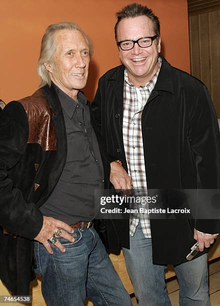 David Carradine and Tom Arnold at the Skybar at Mondrian Hotel in West Hollywood, California