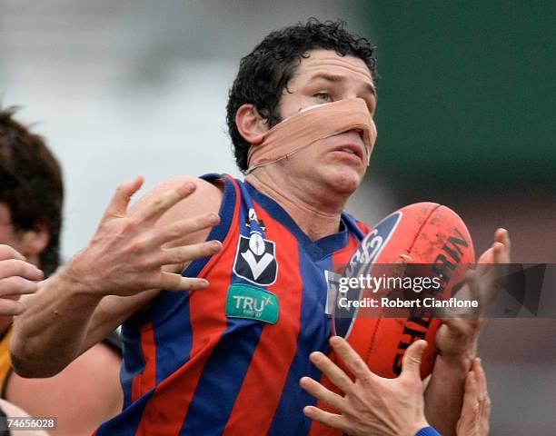 David Robbins of Port Melbourne takes a mark during the round ten VFL match between Port Melbourne and the Werribee Tigers at Teac Oval June 16, 2007...