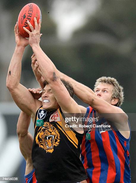 Will Minson of Werribee marks in front of his opponent during the round ten VFL match between Port Melbourne and the Werribee Tigers at Teac Oval...