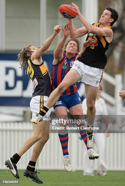 Domenic Gleeson of Werribee marks in front of his opponent during the round ten VFL match between Port Melbourne and the Werribee Tigers at Teac Oval...