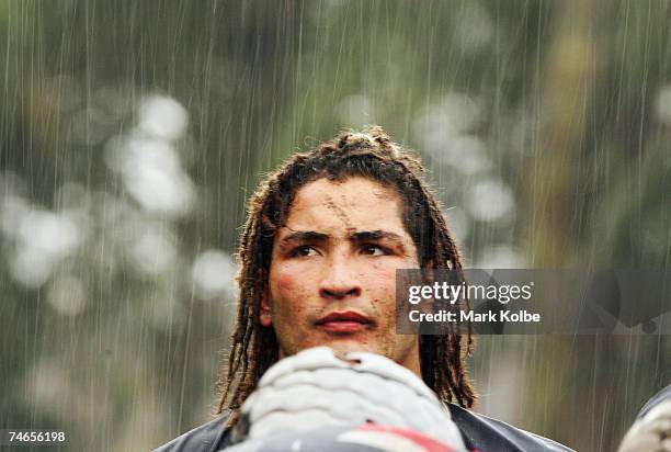 Saia Faingaa of Eastern Suburbs watches heavy rain fall during the round 11 Shute Shield match between Sydney University and Eastern Suburbs at...