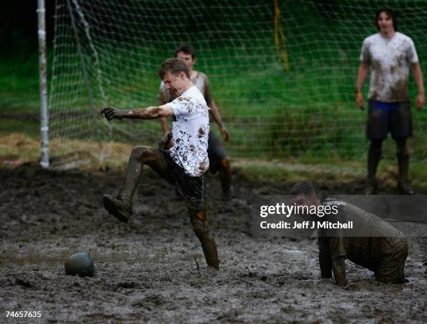 Players take part in the annual UK Swamp Soccer tournament on June 16, 2007 in Dunoon, Scotland .Swamp Soccer originates from the swamps of Finland...