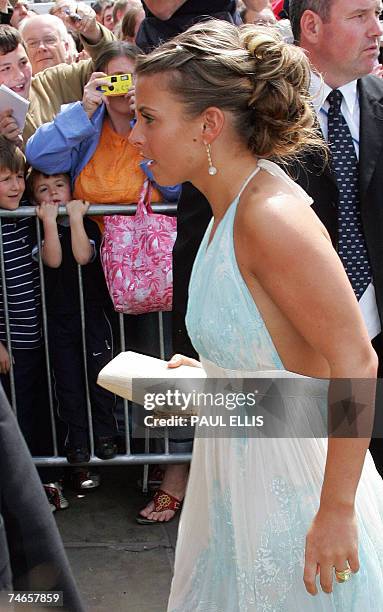 Manchester, UNITED KINGDOM: Coleen McLoughlin, girlfriend of footballer Wayne Rooney, arrives for the wedding of Manchester United and England...